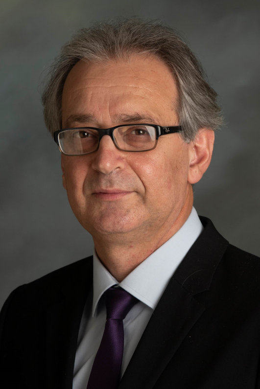 headshot of Melih Papila